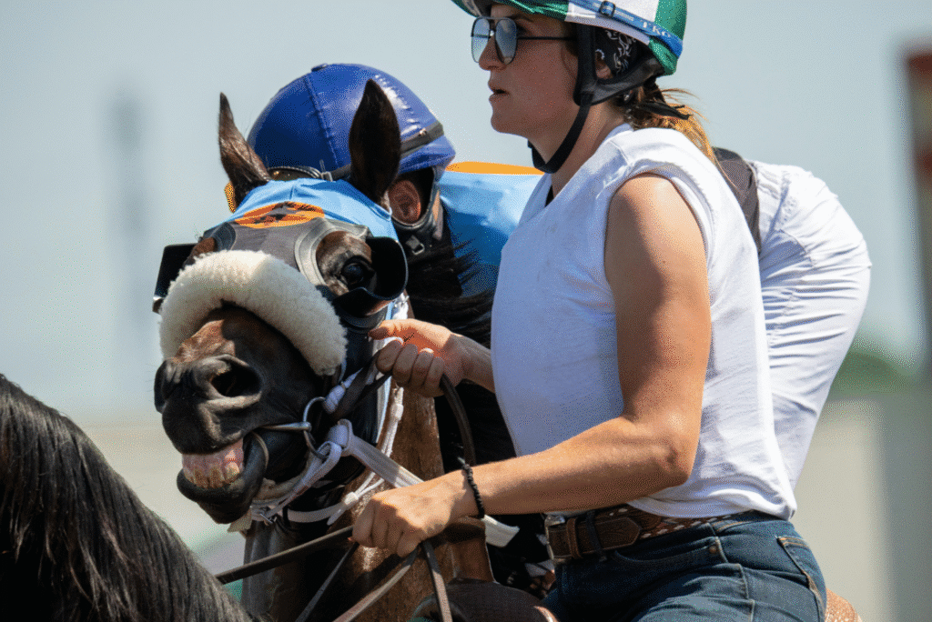 racehorse trainer with jockey